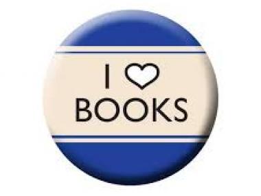 Badge med teksten "I love books"